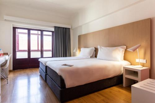 Habitación Doble - 2 camas del hotel Stay Coimbra Centro. Foto 2