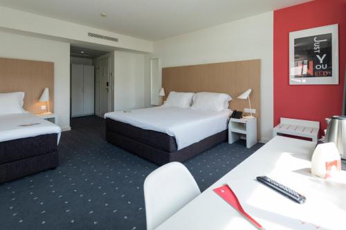 Habitación Triple del hotel Stay Coimbra Centro. Foto 2
