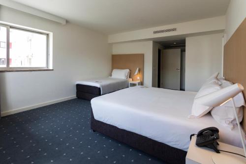 Habitación Triple del hotel Stay Coimbra Centro. Foto 4