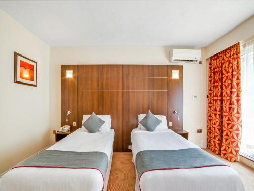 Habitación Doble Estándar - 2 camas del hotel Oyo The Bridge House. Foto 1