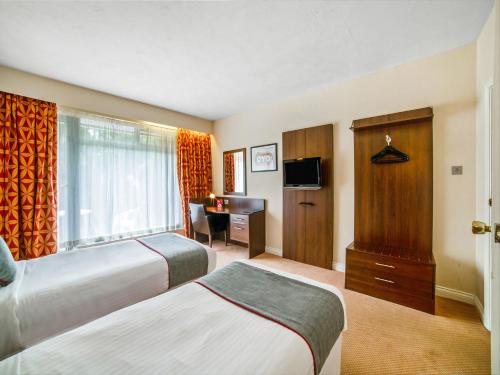 Habitación Doble Estándar - 2 camas del hotel Oyo The Bridge House. Foto 3