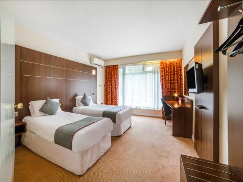 Habitación Doble Estándar - 2 camas del hotel Oyo The Bridge House. Foto 5