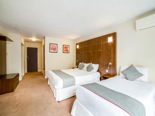 Habitación Triple Deluxe del hotel Oyo The Bridge House. Foto 3