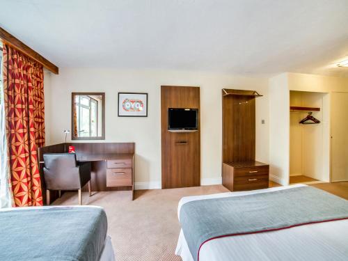 Habitación Triple Deluxe del hotel Oyo The Bridge House. Foto 6