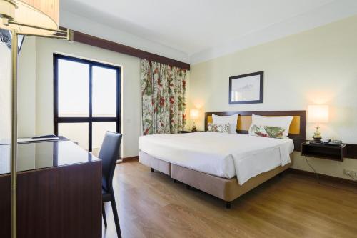 Habitación Doble - Paquete romántico del hotel D. Luís. Foto 16