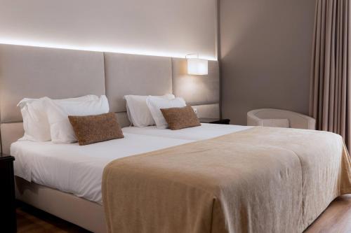 Habitación Doble Estándar - 2 camas del hotel Covilha Dona Maria Affiliated By Melia. Foto 1