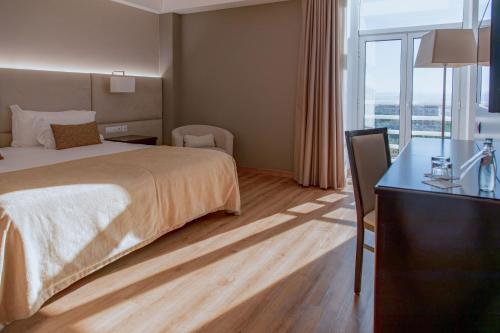Habitación Doble Estándar - 2 camas del hotel Covilha Dona Maria Affiliated By Melia. Foto 9