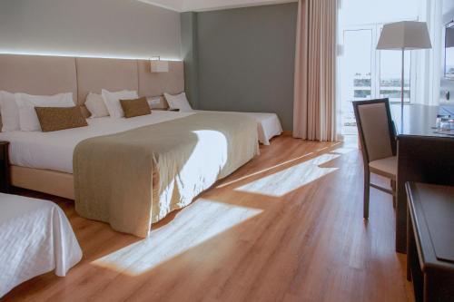 Habitación Familiar del hotel Covilha Dona Maria Affiliated By Melia. Foto 1