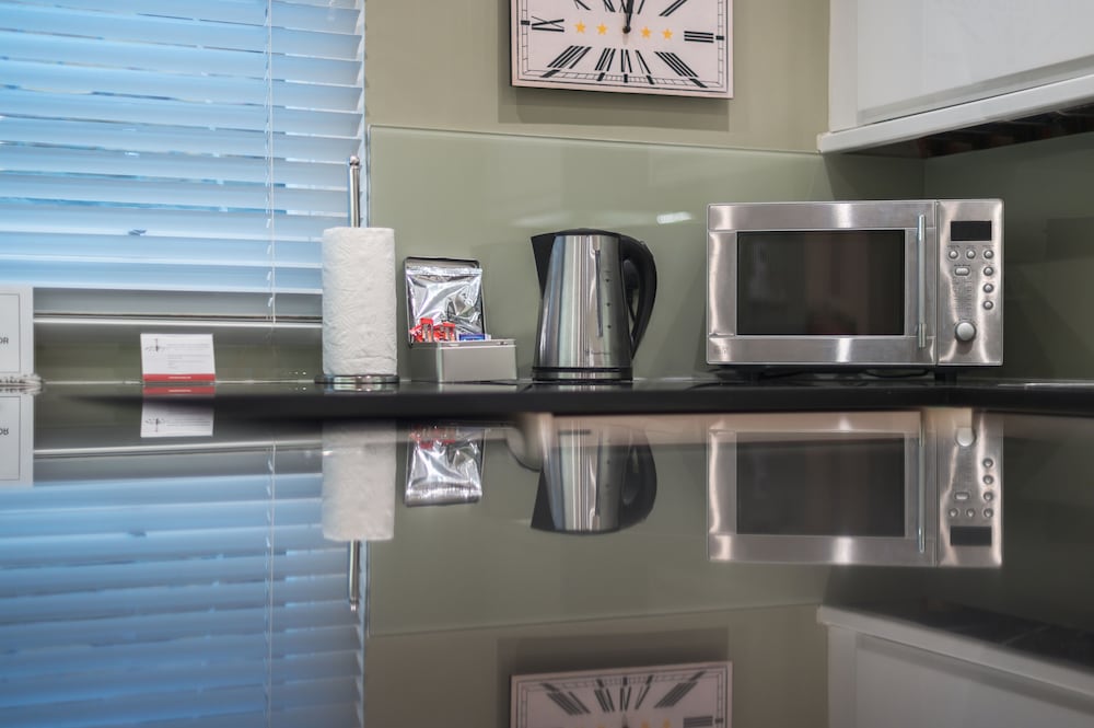 Estudio, cocina del hotel No 1 The Mansion Apartments By Mansley. Foto 6