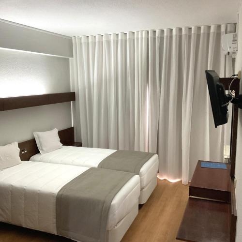 Habitación Doble - 2 camas del hotel Costa De Prata 2 and Spa. Foto 1