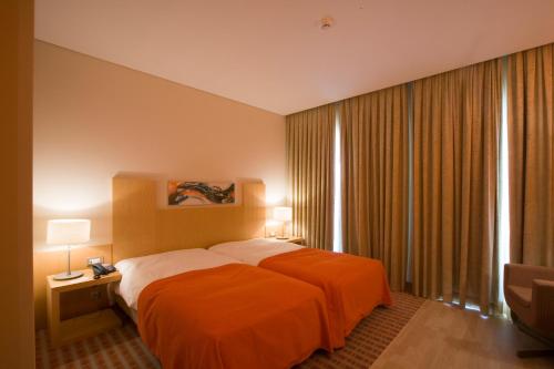 Habitación Doble con balcón - 1 o 2 camas del hotel Praia. Foto 1