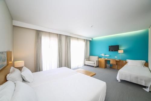 Habitación Triple del hotel Praia. Foto 4