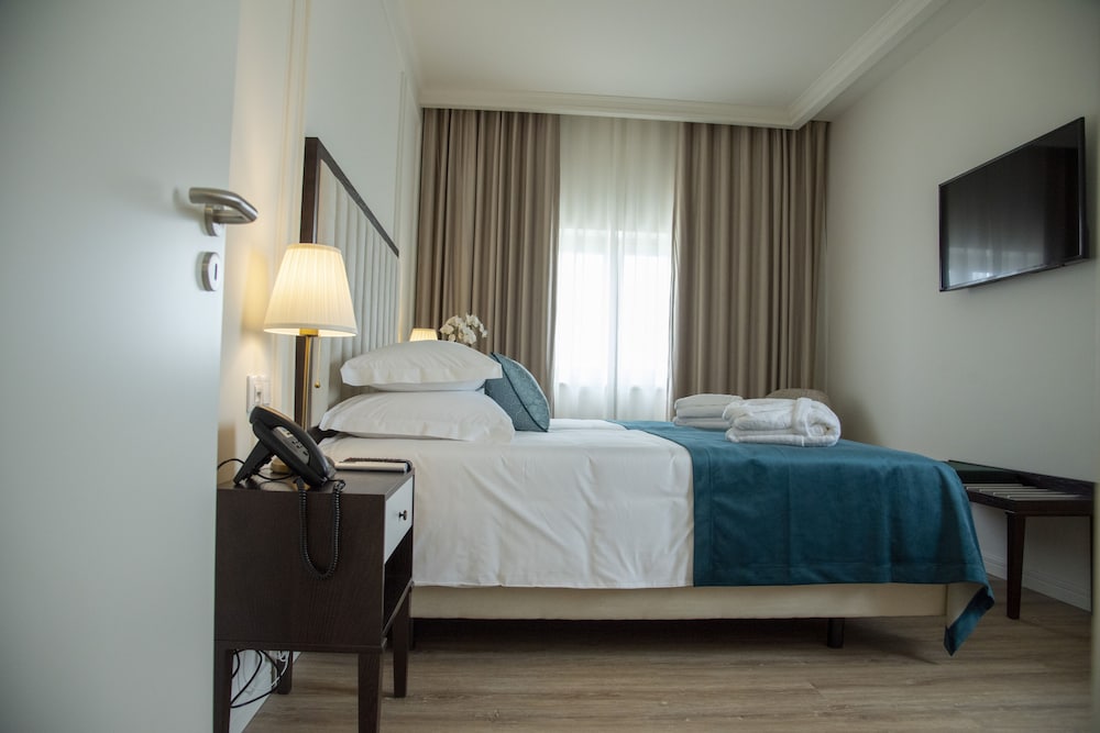 Habitación con 1 cama doble o 2 individuales del hotel Luna De Tábua. Foto 2