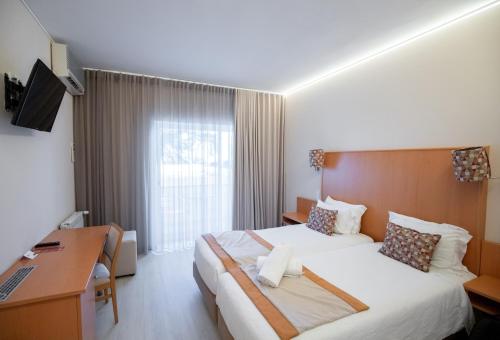 Habitación Doble Estándar - 2 camas del hotel Lido. Foto 5