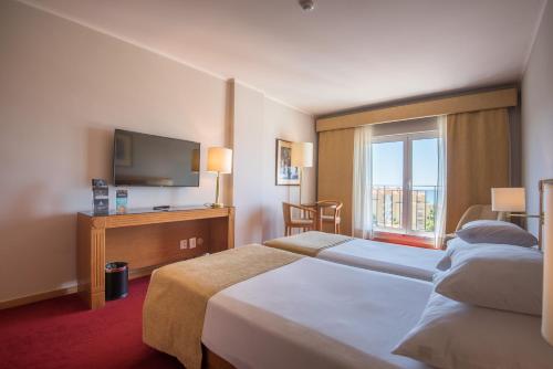 Habitación Doble con vistas al mar - 1 o 2 camas del hotel Vila Galé Estoril. Foto 2