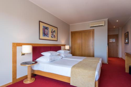 Habitación Individual del hotel Vila Galé Estoril. Foto 1
