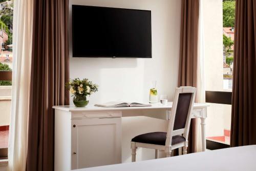 Habitación Doble Superior con vistas al valle - 1 o 2 camas del hotel Nh Sintra Centro. Foto 1