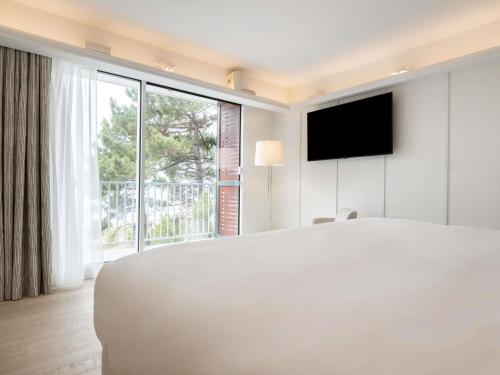 Suite Junior con 1 cama doble, vistas al océano del hotel Bel Oléron Thalasso & Spa - MGallery Collection. Foto 7