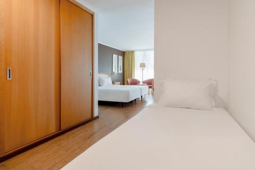 Habitación Triple del hotel Orquidea. Foto 1