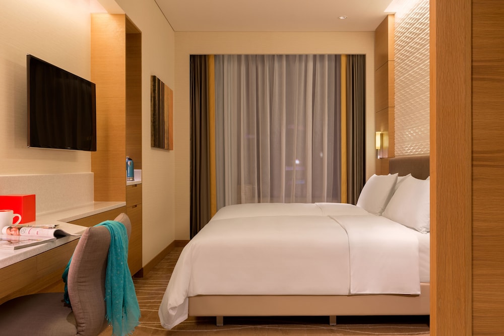 Habitación superior con 2 camas individuales, vistas a la ciudad del hotel Jen Singapore Orchardgateway By Shangri-la