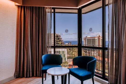 Habitación Doble con vistas al mar - 2 camas del hotel Enotel Magnólia. Foto 7