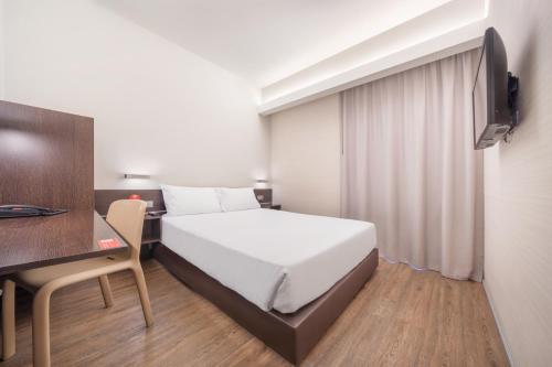 Habitación Doble Estándar del hotel Moov Évora. Foto 8