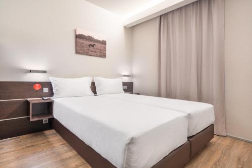 Habitación Doble Estándar - 2 camas del hotel Moov Évora. Foto 4