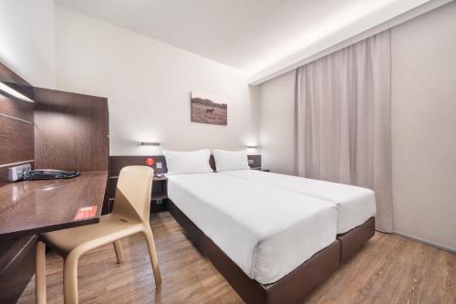 Habitación Doble Estándar - 2 camas del hotel Moov Évora. Foto 7