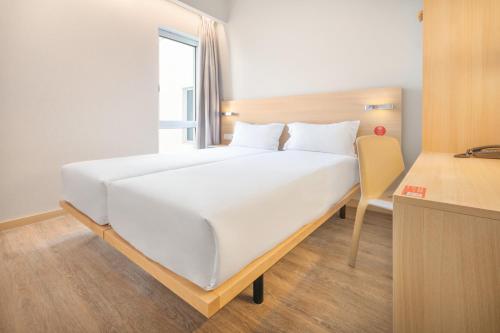 Habitación Doble Estándar - 2 camas del hotel Moov Évora. Foto 10