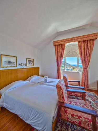 Habitación Triple con vistas al mar del hotel Monte Carlo. Foto 4