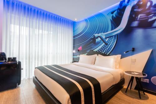 Habitación Melody - Cama grande del hotel Hf Fénix Music