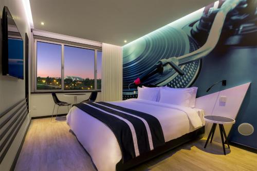 Habitación Melody - Cama extragrande del hotel Hf Fénix Music