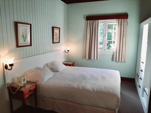 Habitación Doble con vistas al jardín - Ático del hotel Quinta Da Penha De França. Foto 1