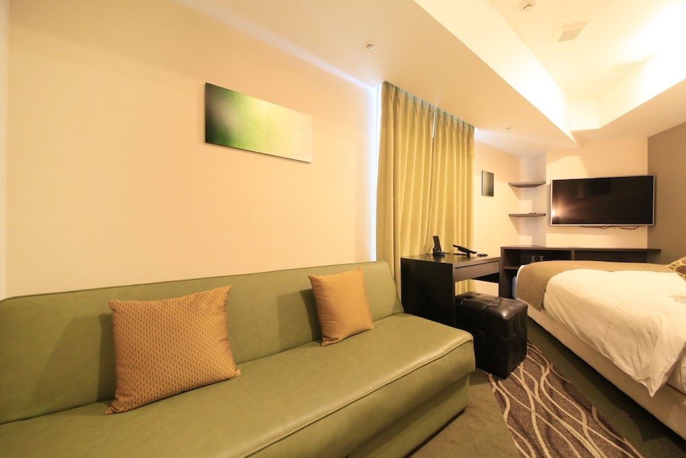 Habitación Superior de esquina Queen con cama supletoria a partir del 3er adulto, no fumadores del hotel Centurion Ikebukuro. Foto 3