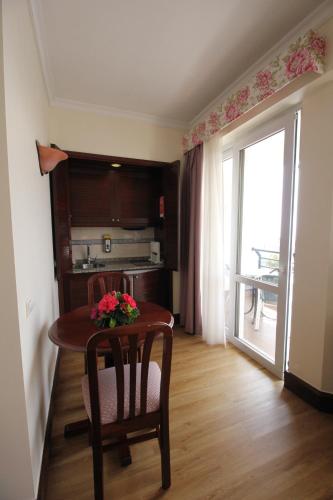 Estudio del hotel Jardins d'Ajuda Suite. Foto 1