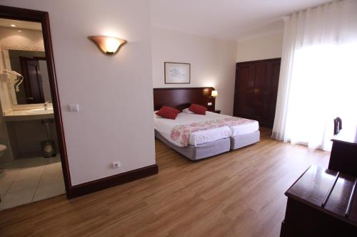 Habitación Doble Económica - 2 camas del hotel Jardins d'Ajuda Suite. Foto 3