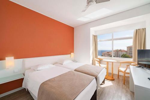 Habitación Doble con balcón del hotel Dorisol Estrelicia. Foto 4
