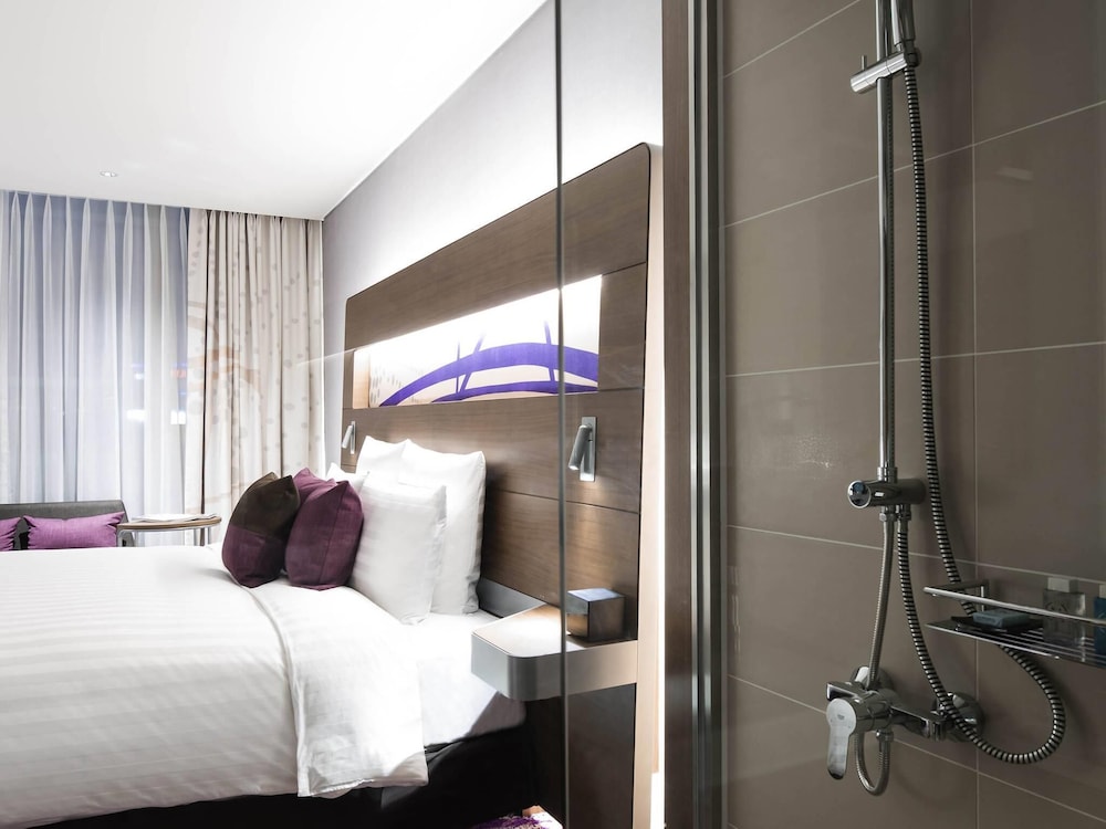 Habitación Superior con 1 Cama King del hotel Novotel Ambassador Suwon. Foto 4