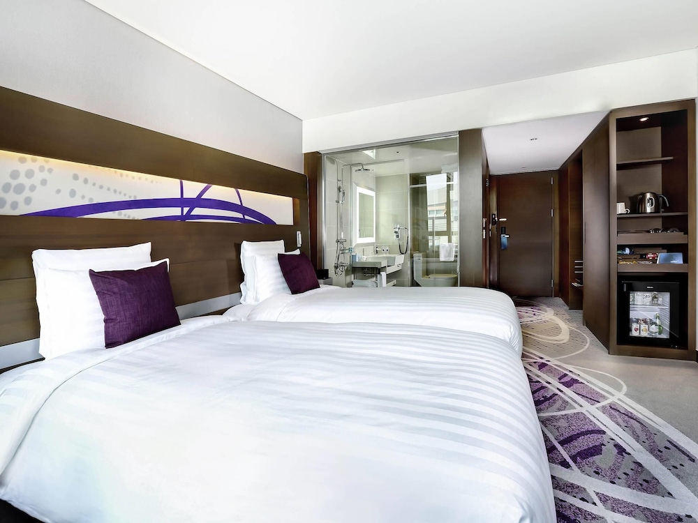 Habitación superior con 2 camas individuales del hotel Novotel Ambassador Suwon