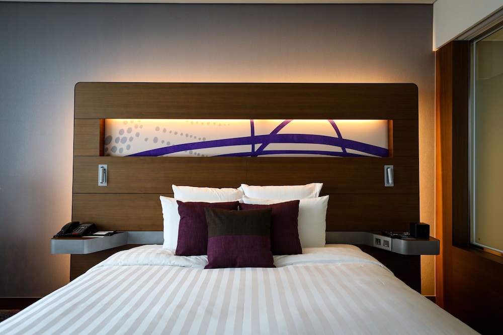 Habitación Deluxe con 1 cama king del hotel Novotel Ambassador Suwon. Foto 2