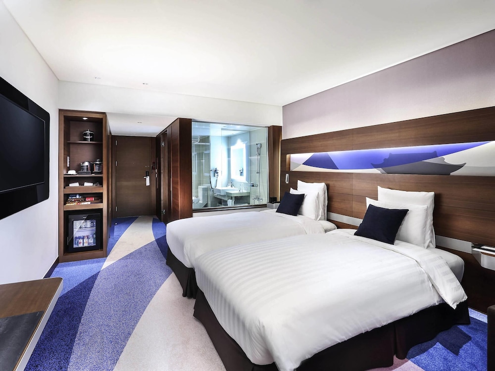 Habitación Ejecutiva con cama King del hotel Novotel Ambassador Suwon