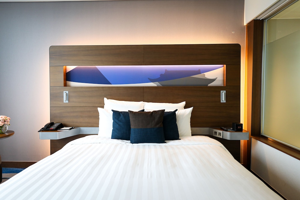 Habitación Ejecutiva con cama King del hotel Novotel Ambassador Suwon. Foto 2