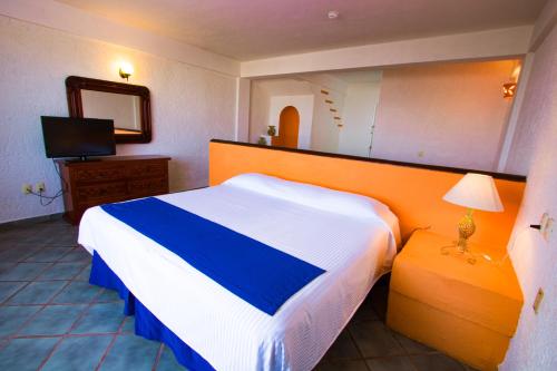 Habitación Estándar - 1 cama extragrande del hotel Decameron Los Cocos Guayabitos, Ramada All-Inclusive Resort. Foto 3