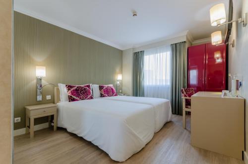 Habitación doble Vista ciudad Con Vistas del hotel Olissippo Marques De Sa. Foto 4