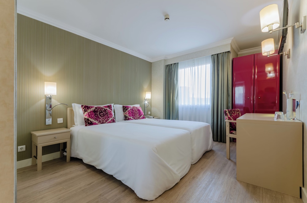 Habitación con 1 cama doble o 2 individuales del hotel Olissippo Marques De Sa