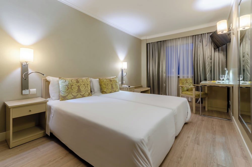 Habitación con 1 cama doble o 2 individuales del hotel Olissippo Marques De Sa. Foto 11