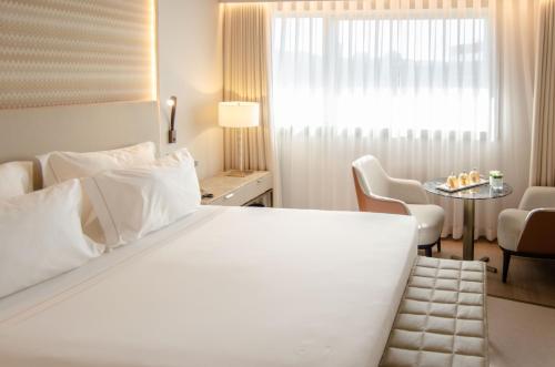 Habitación Familiar Deluxe del hotel Epic Sana Marques. Foto 1