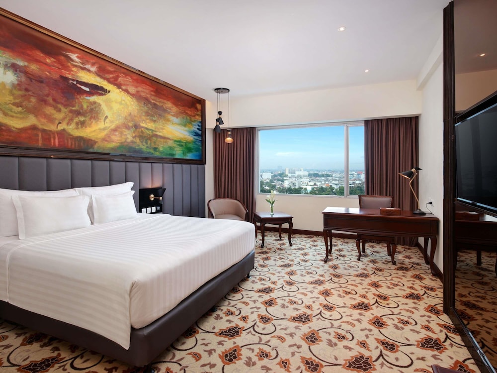Habitación Deluxe, 1 cama de matrimonio grande del hotel Grand Mercure Medan Angkasa