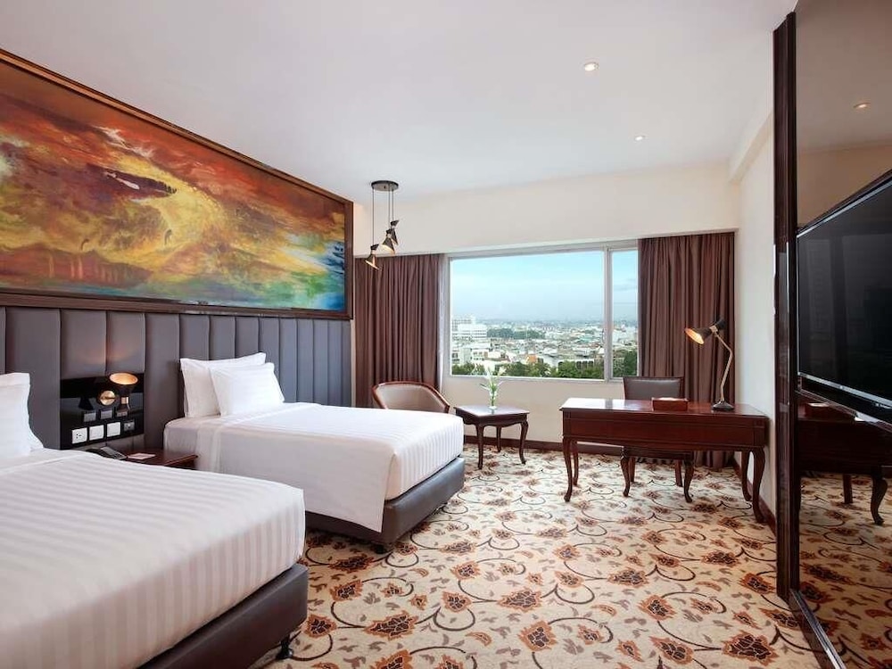 Habitación Deluxe, 2 camas individuales del hotel Grand Mercure Medan Angkasa. Foto 2