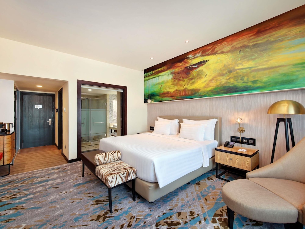 Habitación ejecutiva, 1 cama de matrimonio grande del hotel Grand Mercure Medan Angkasa
